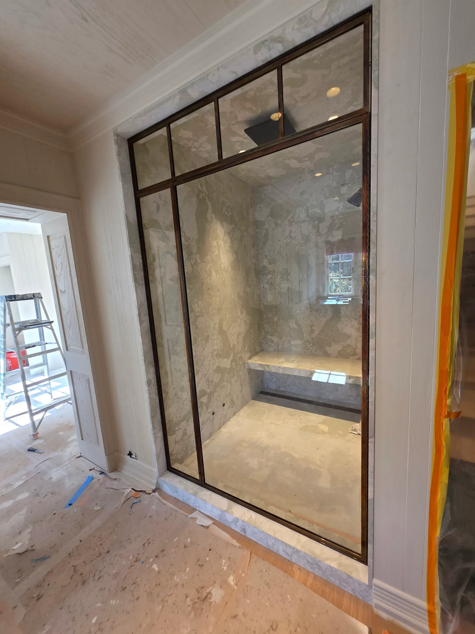 Black-framed glass partition door